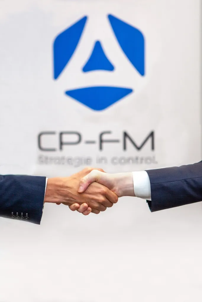 Handen schudden bij een intakegesprek voor CP-FM